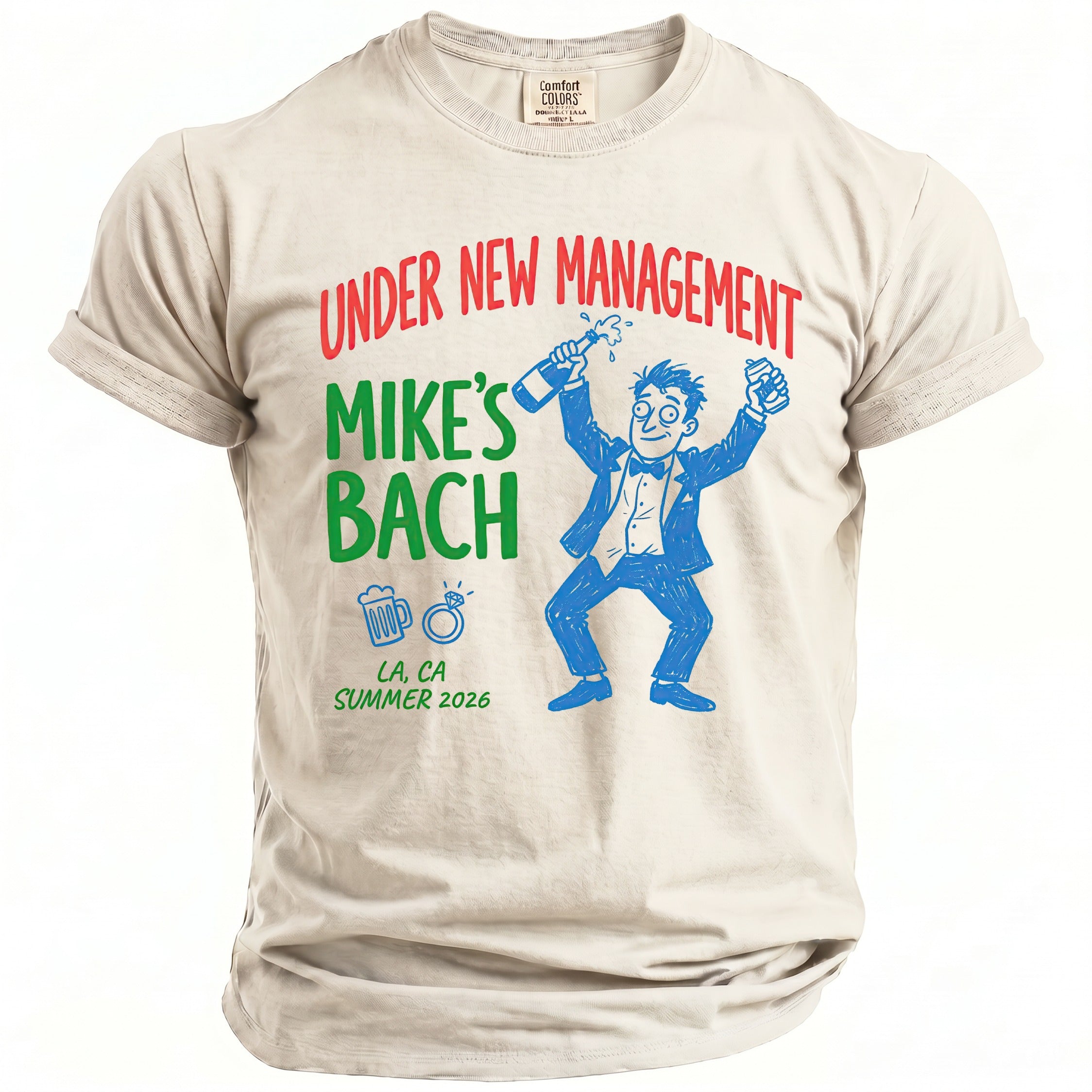 T-shirt with "Under New Management Mike's Bach" and a cartoon celebrating.