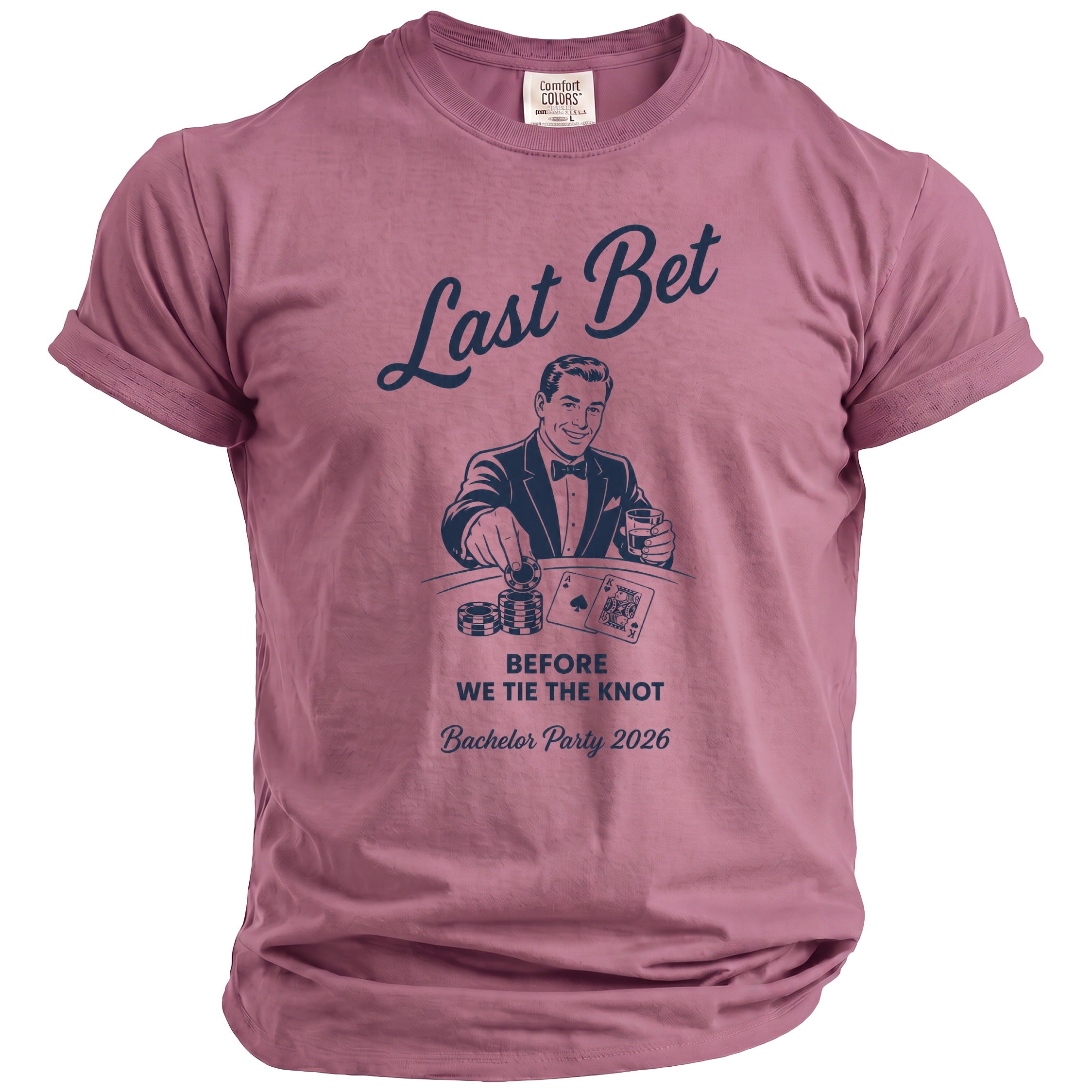 Pink t-shirt with a graphic reading "Last Bet" and "Bachelor Party 2026".