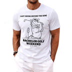 T-shirt with dragon golfing graphic and text "LAST SWING BEFORE THE RING BACHELOR GOLF WEEKEND".