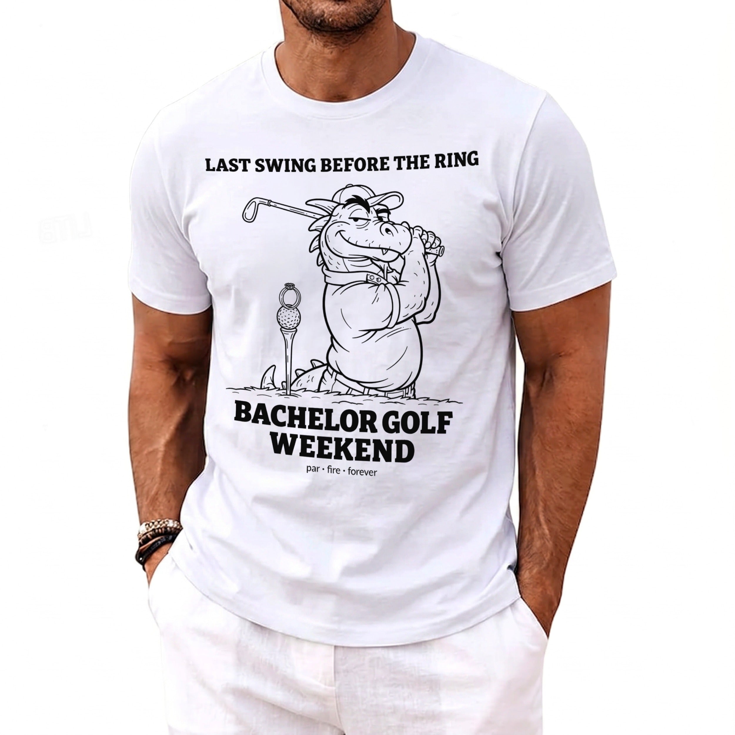 T-shirt with dragon golfing graphic and text "LAST SWING BEFORE THE RING BACHELOR GOLF WEEKEND".