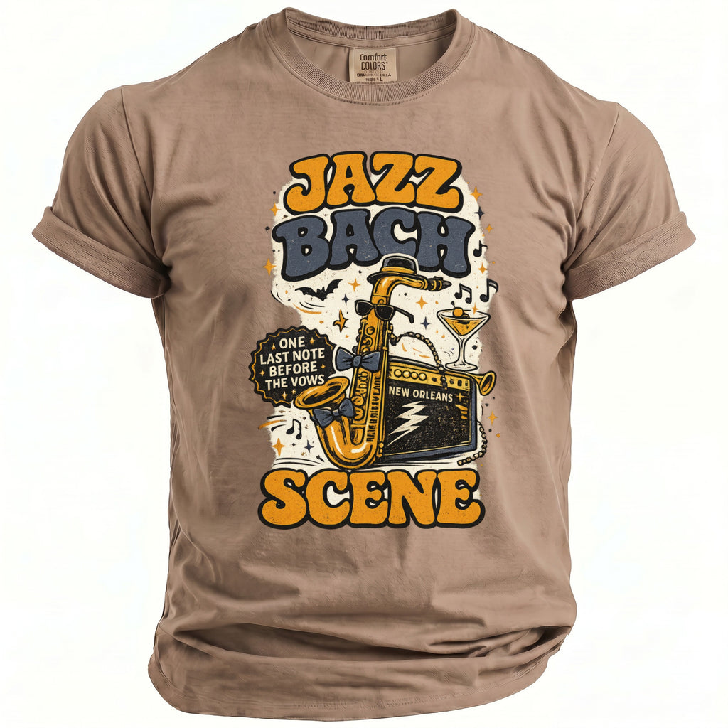 Front of tan t-shirt with "JAZZ BACH SCENE" text, saxophone, and New Orleans graphics.