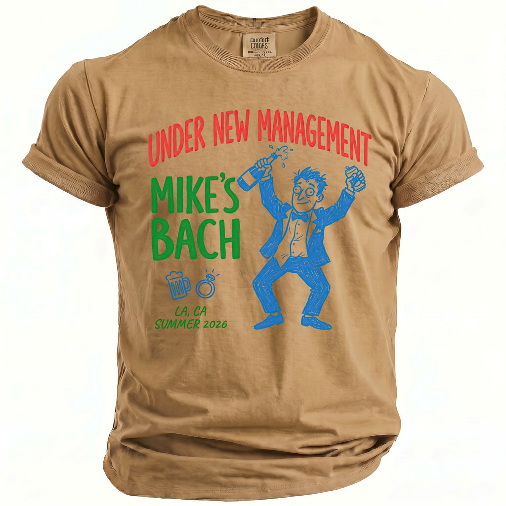 Tan t-shirt with "Under New Management Mike's Bach" event details.
