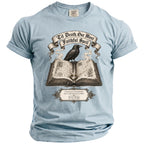 Light blue t-shirt with raven on open book, reading 'Til Death, Our Most Faithful Spell'.