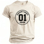 Light beige t-shirt with "GROOM'S NAME 01 GROOM" printed in a circle.