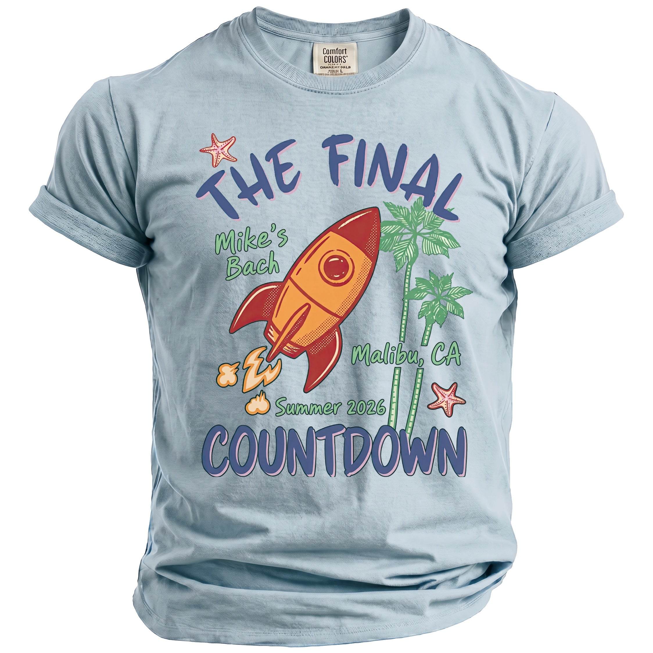 Light blue t-shirt with a rocket and text "The Final Countdown" for "Mike's Bach Malibu, CA Summer 2026".