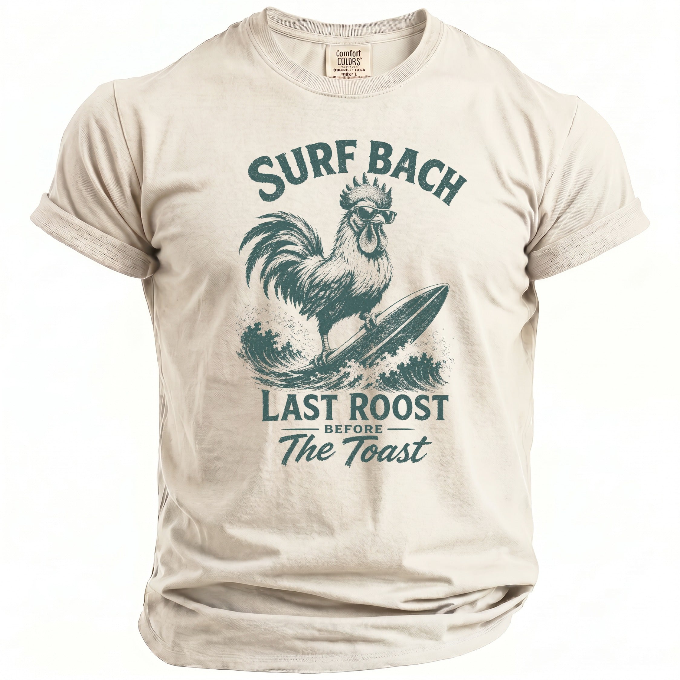 Cream t-shirt with graphic of rooster surfing, text "SURF BACH LAST ROOST BEFORE The Toast".