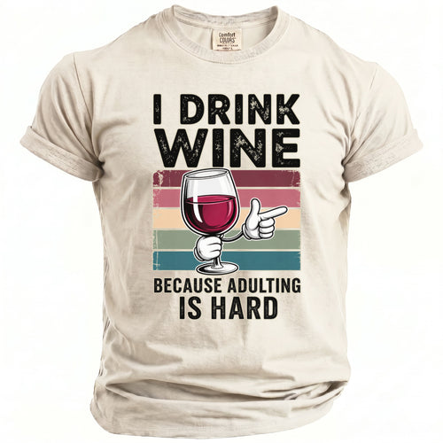T-shirt with "I DRINK WINE BECAUSE ADULTING IS HARD" text and wine glass graphic.