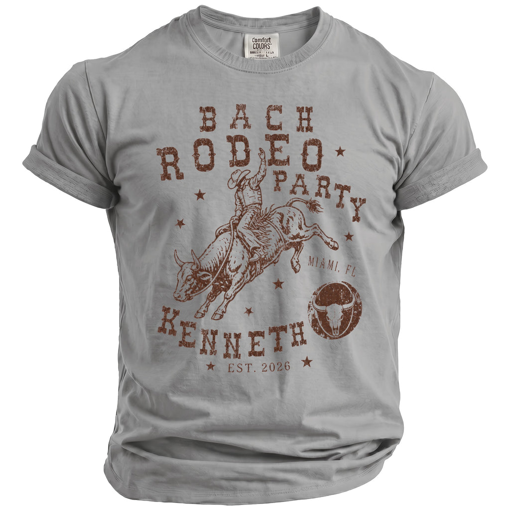 Grey t-shirt with "Bach Rodeo Party", "Kenneth", and bull rider graphic.