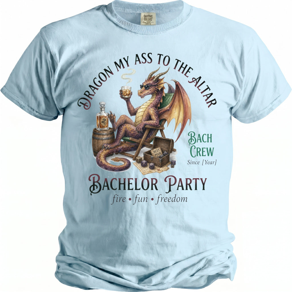 Light blue t-shirt with a dragon, whiskey, dice, and "Bachelor Party" text.