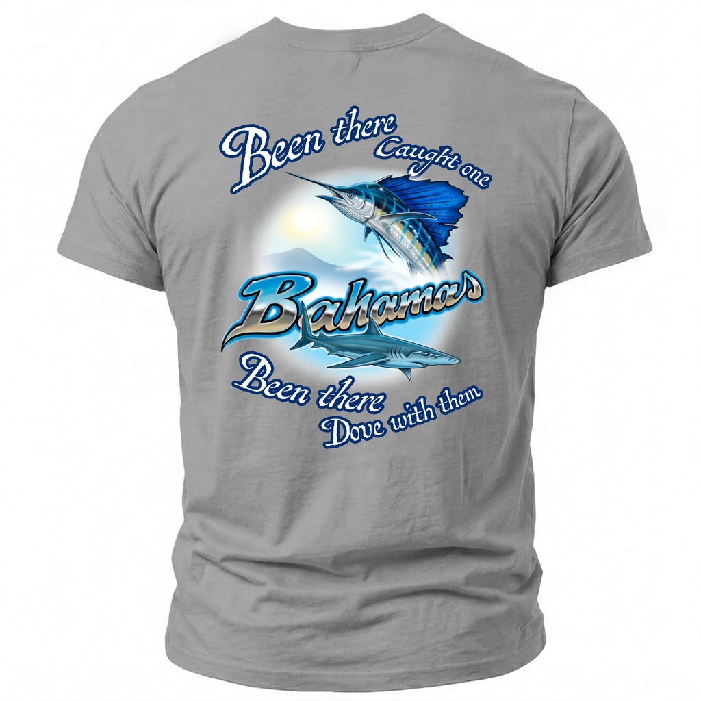 T-shirt graphic of a sailfish over sharks with text: Been there Caught one Bahamas Dove with them.
