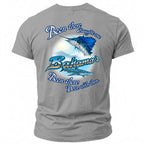 T-shirt graphic of a sailfish over sharks with text: Been there Caught one Bahamas Dove with them.