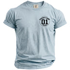 Light blue t-shirt with black text "GROOM'S NAME 01 GROOM" on the chest.