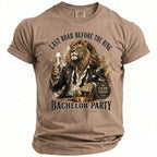 T-shirt with a lion in a suit holding champagne, text "Last Roar Before the Ring" and "Bachelor Party".