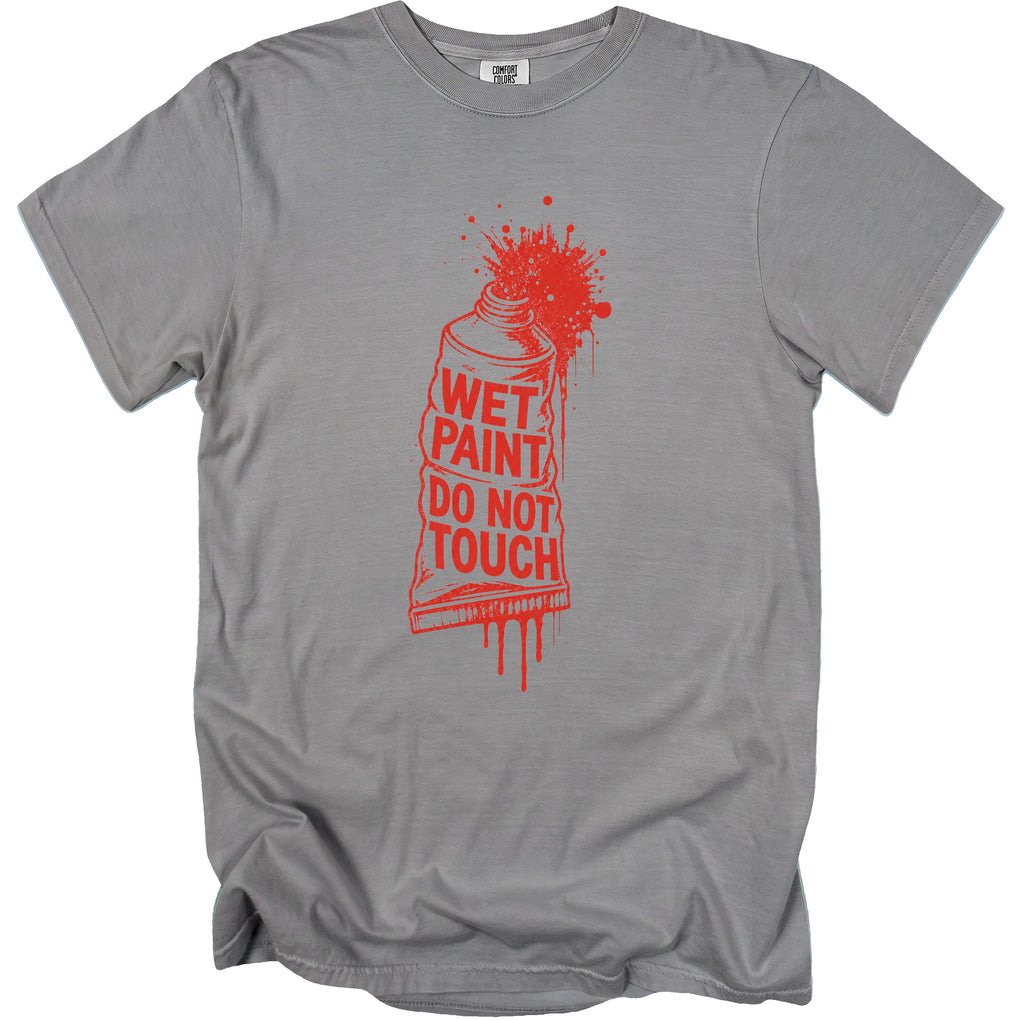 Grey t-shirt with red "Wet Paint Do Not Touch" text and paint splatter graphic.