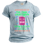 Light blue t-shirt with pink tiki mask, "The Final Countdown", "Mike's Bach", and location/date text.