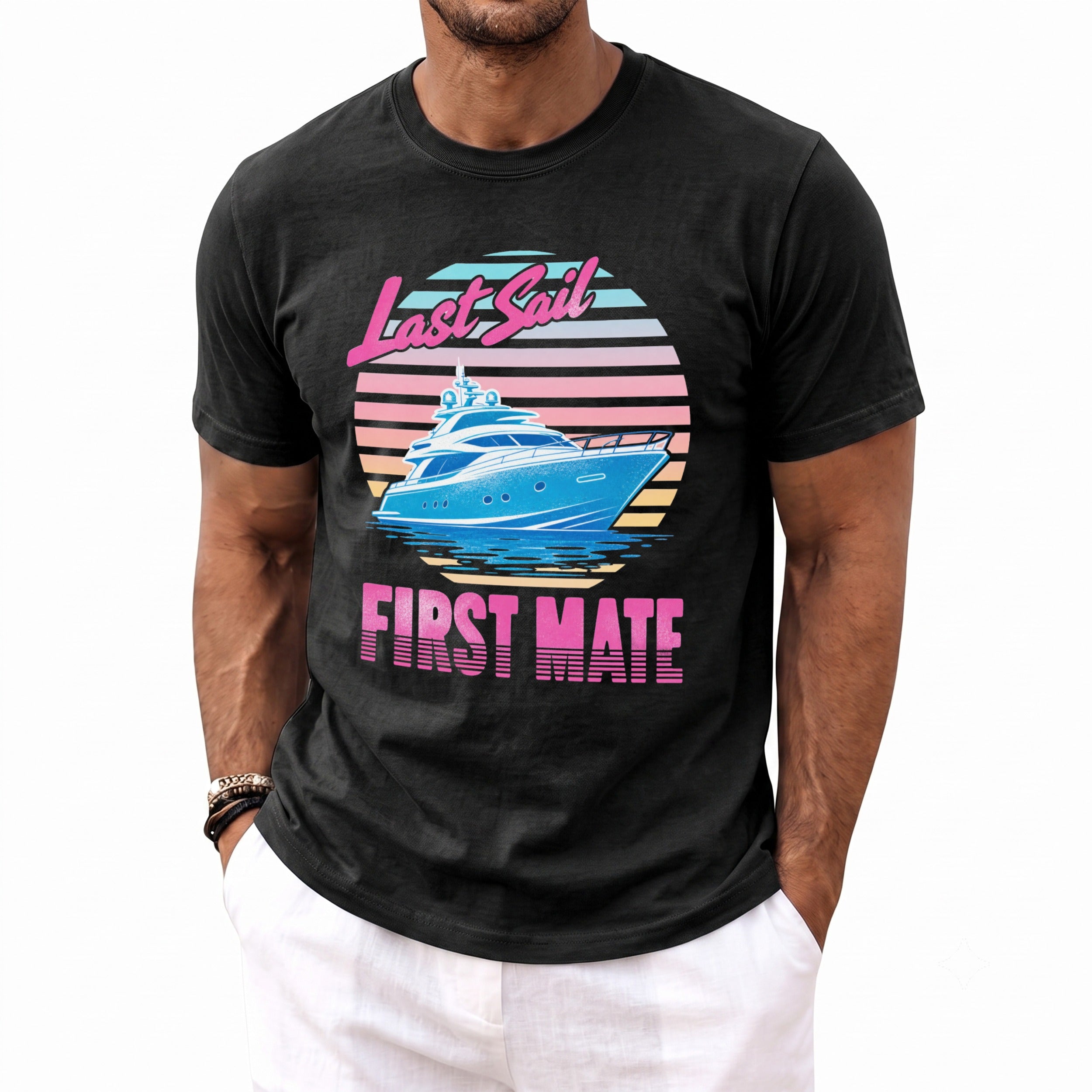 A man wearing a black t-shirt printed with a blue yacht graphic and the text Last Sail First Mate.
