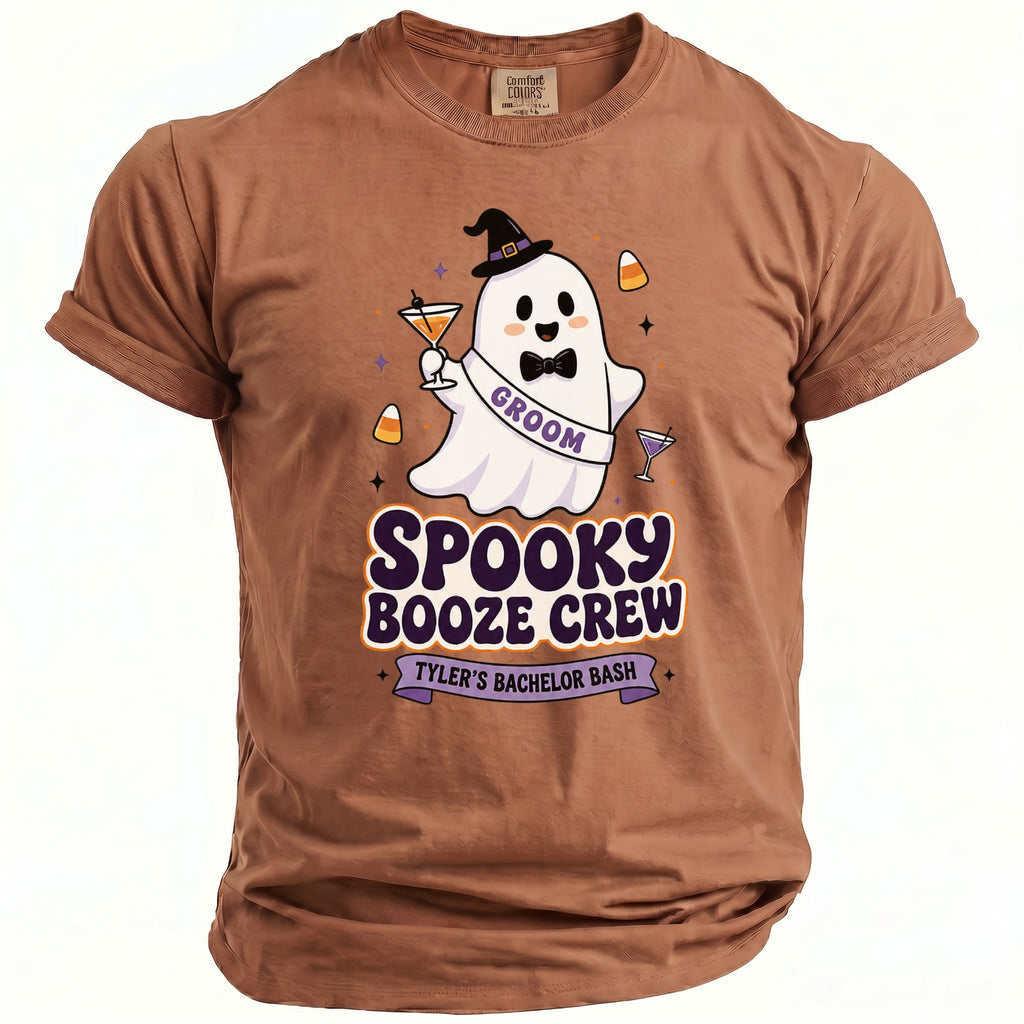 Brown t-shirt with a ghost graphic saying "Groom" and "Spooky Booze Crew Tyler's Bachelor Bash".