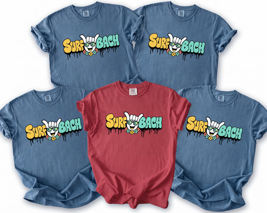 T-shirts with "Surf Bach" text and cartoon surfer graphic on a white background.