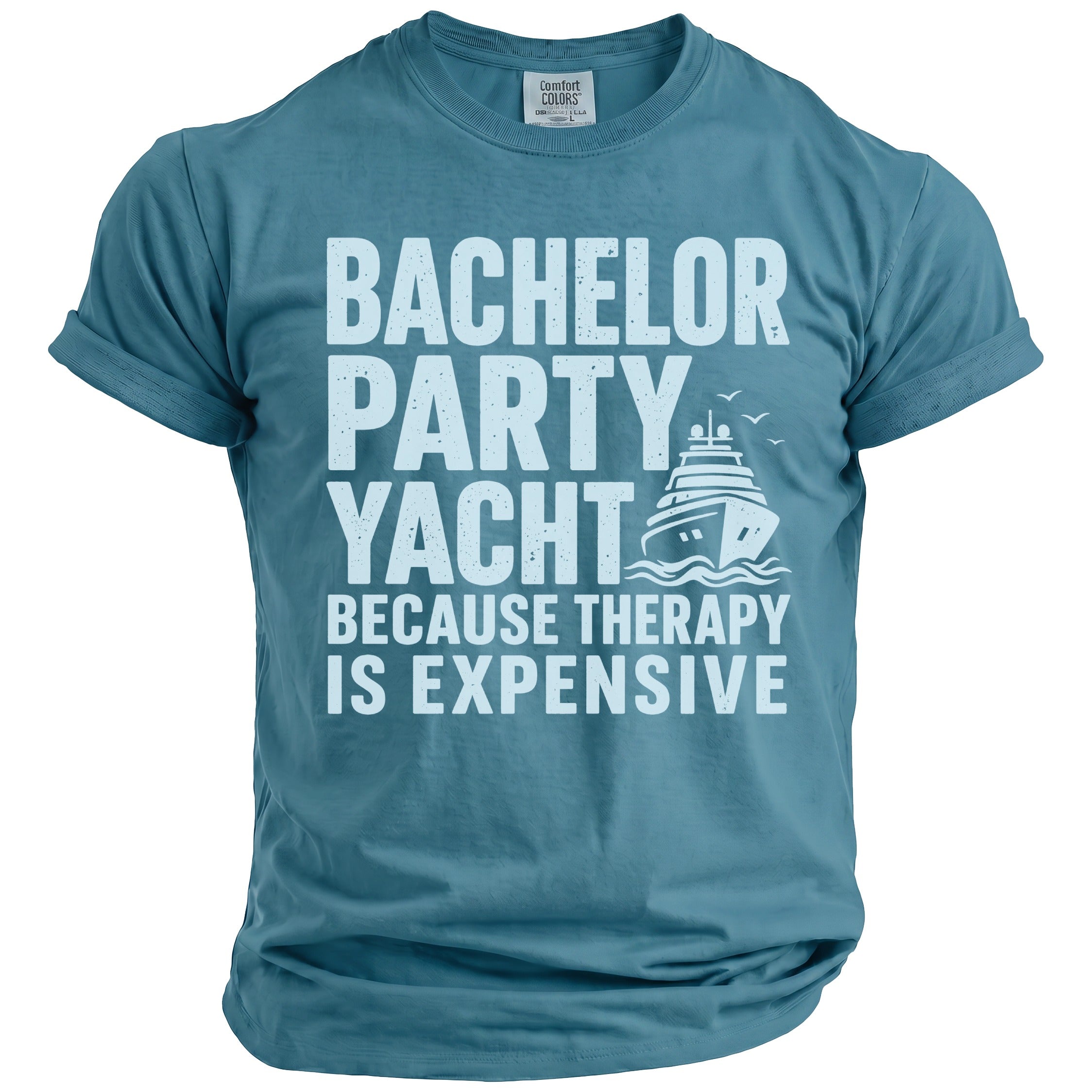 Blue t-shirt with white text "BACHELOR PARTY YACHT BECAUSE THERAPY IS EXPENSIVE" and a yacht graphic.