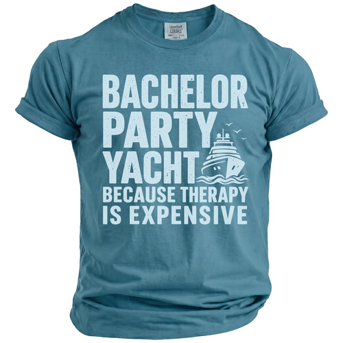 Blue t-shirt with white text "BACHELOR PARTY YACHT BECAUSE THERAPY IS EXPENSIVE" and a yacht graphic.