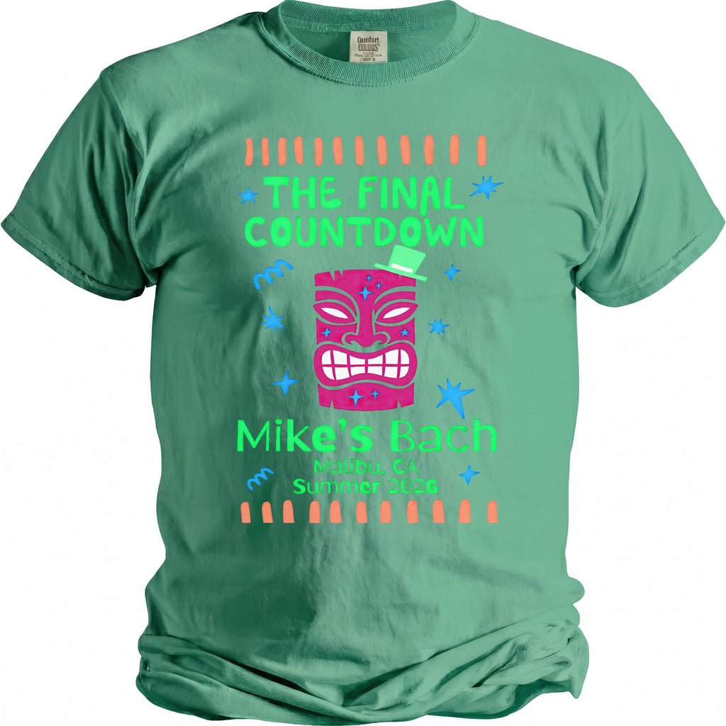 Green t-shirt with pink tiki mask and text "The Final Countdown" and "Mike's Bach Malibu, CA Summer 2026."