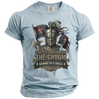 Light blue shirt featuring medieval knight graphic and text "The Fellowship of The Groom Kenneth's Bach".