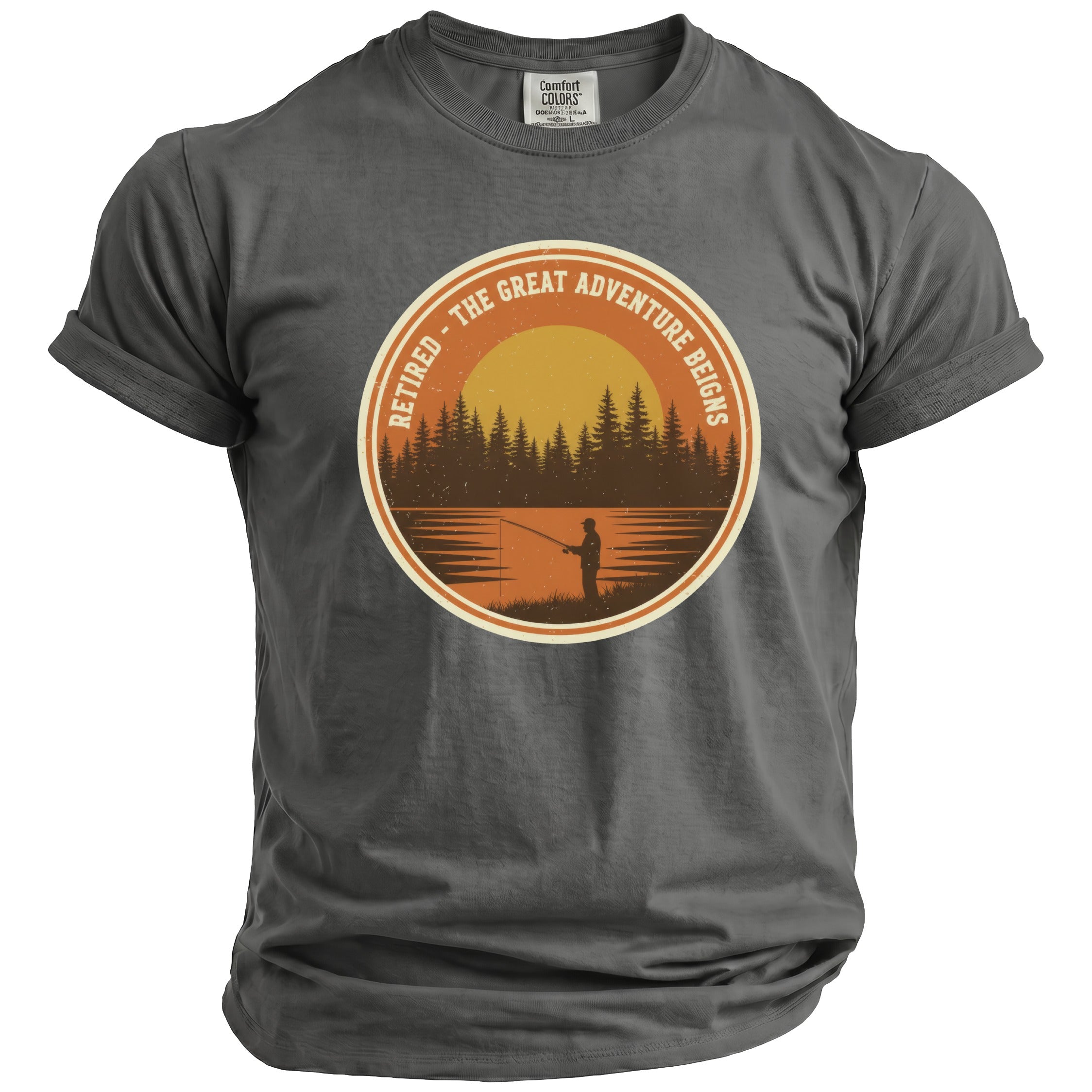T-shirt with a circular graphic of a sunset, trees, and a fisherman. Text reads: "Retired - The Great Adventure Reigns".