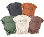 T-shirts in multiple colors featuring line art of a convertible, text "Quiet Luxury Groom".