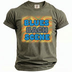 Khaki Comfort Colors t-shirt with "BLUES BACH SCENE" text and retro design.