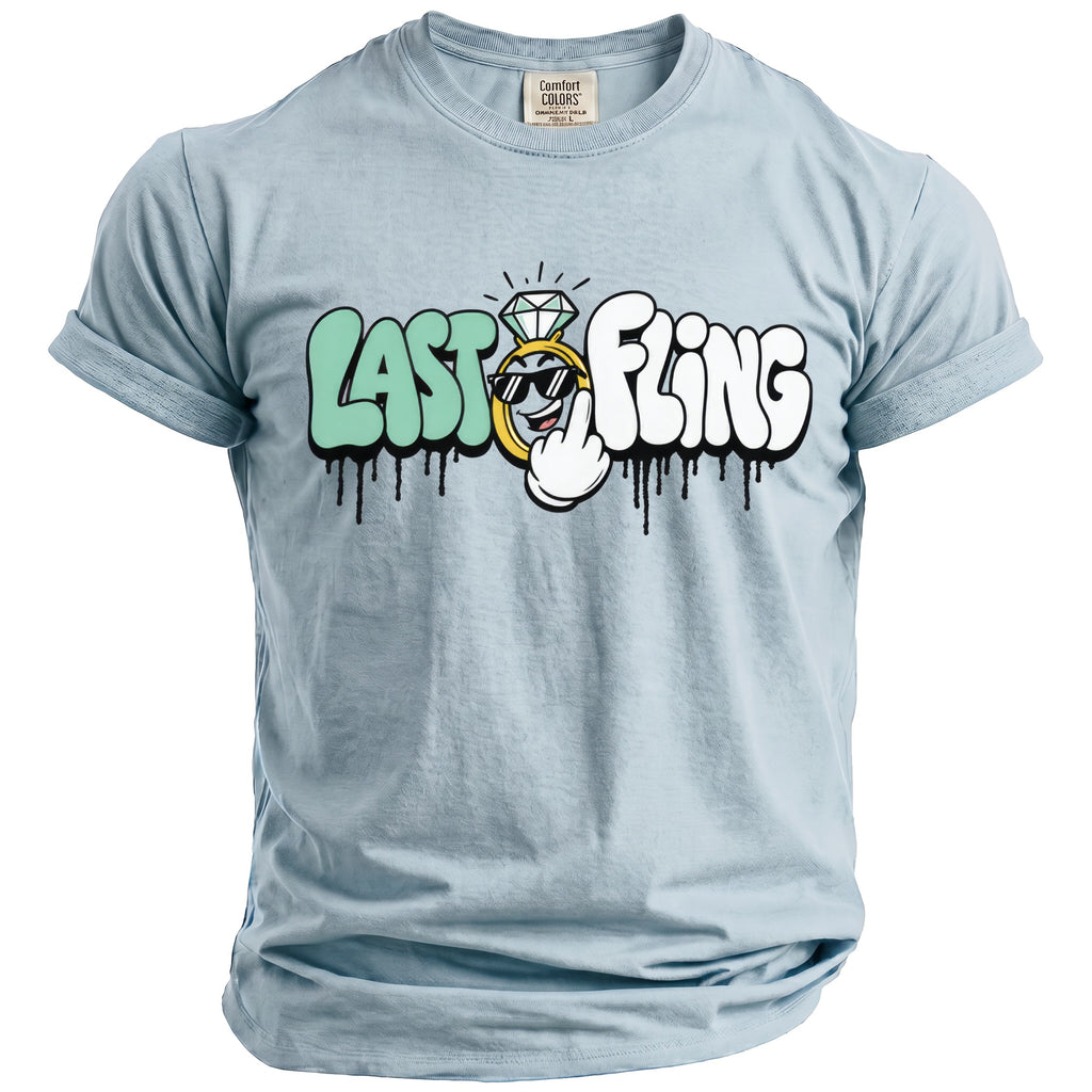 Light blue t-shirt with "LAST FLING" text, engagement ring, and cartoon character graphic.