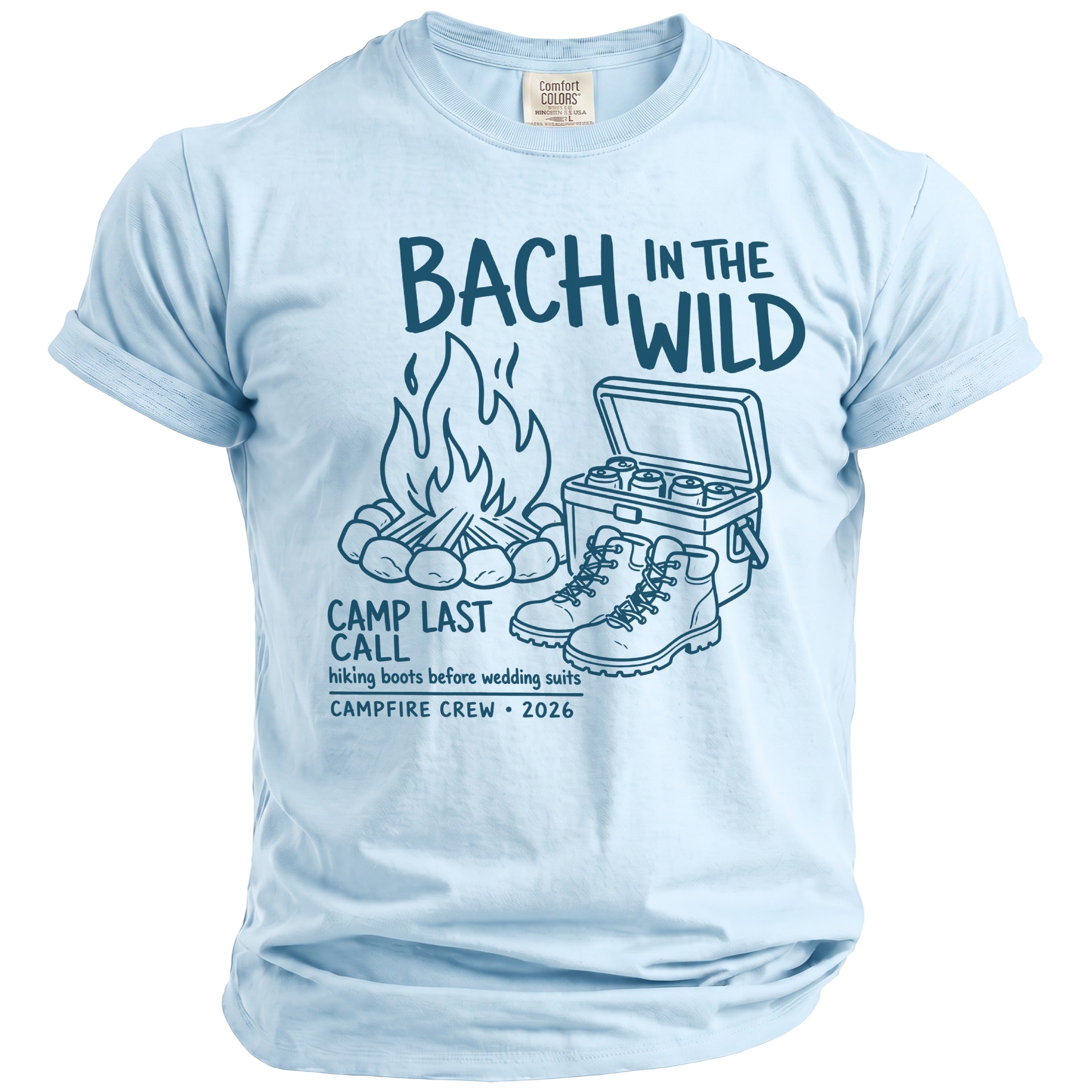 Light blue t-shirt with "Bach In The Wild" graphic, campfire, cooler, and boots.