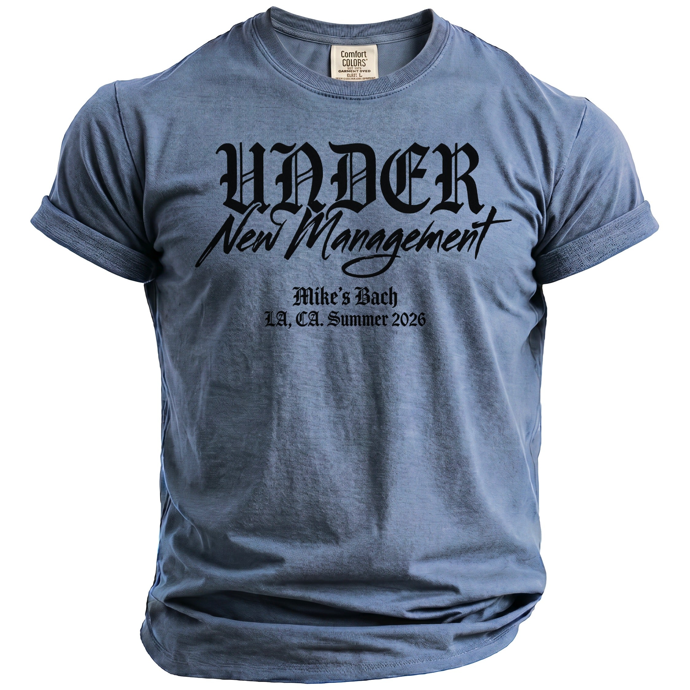 Blue t-shirt with text "Under New Management", "Mike's Bach", and "LA, CA. Summer 2026".