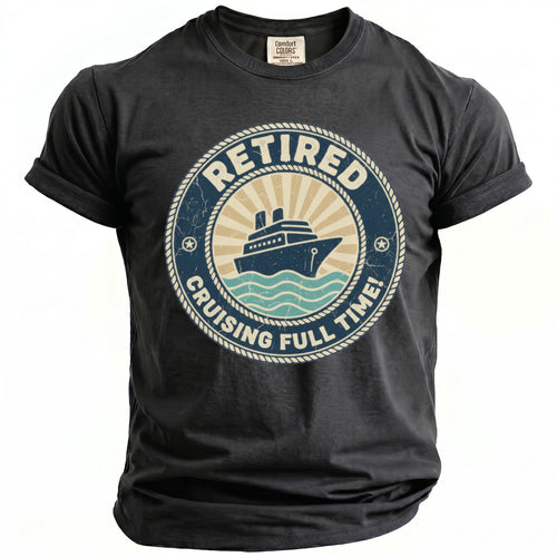 Dark grey t-shirt with a circular graphic reading "Retired Cruising Full Time!" featuring a cruise ship.