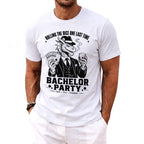 White t-shirt graphic of a dragon in a suit holding cards and a drink, with text.