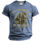 Blue t-shirt graphic: Dwarf with hammer and beer, "The Fellowship of the Groom," "Kenneth's Bach," "Edinburgh, Scotland Summer 2026."