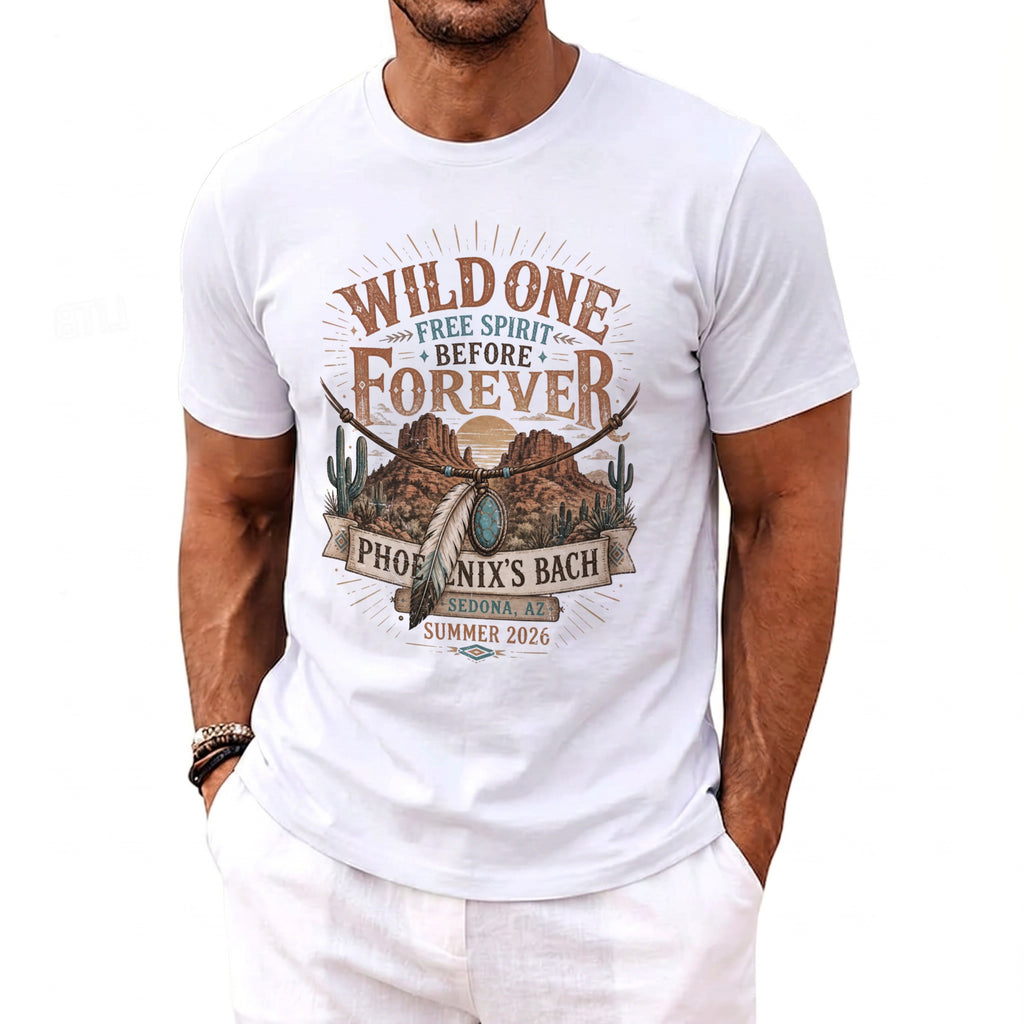 White t-shirt graphic with text "Wild One Free Spirit Before Forever", Phoenix's Bach, Sedona AZ, Summer 2026.