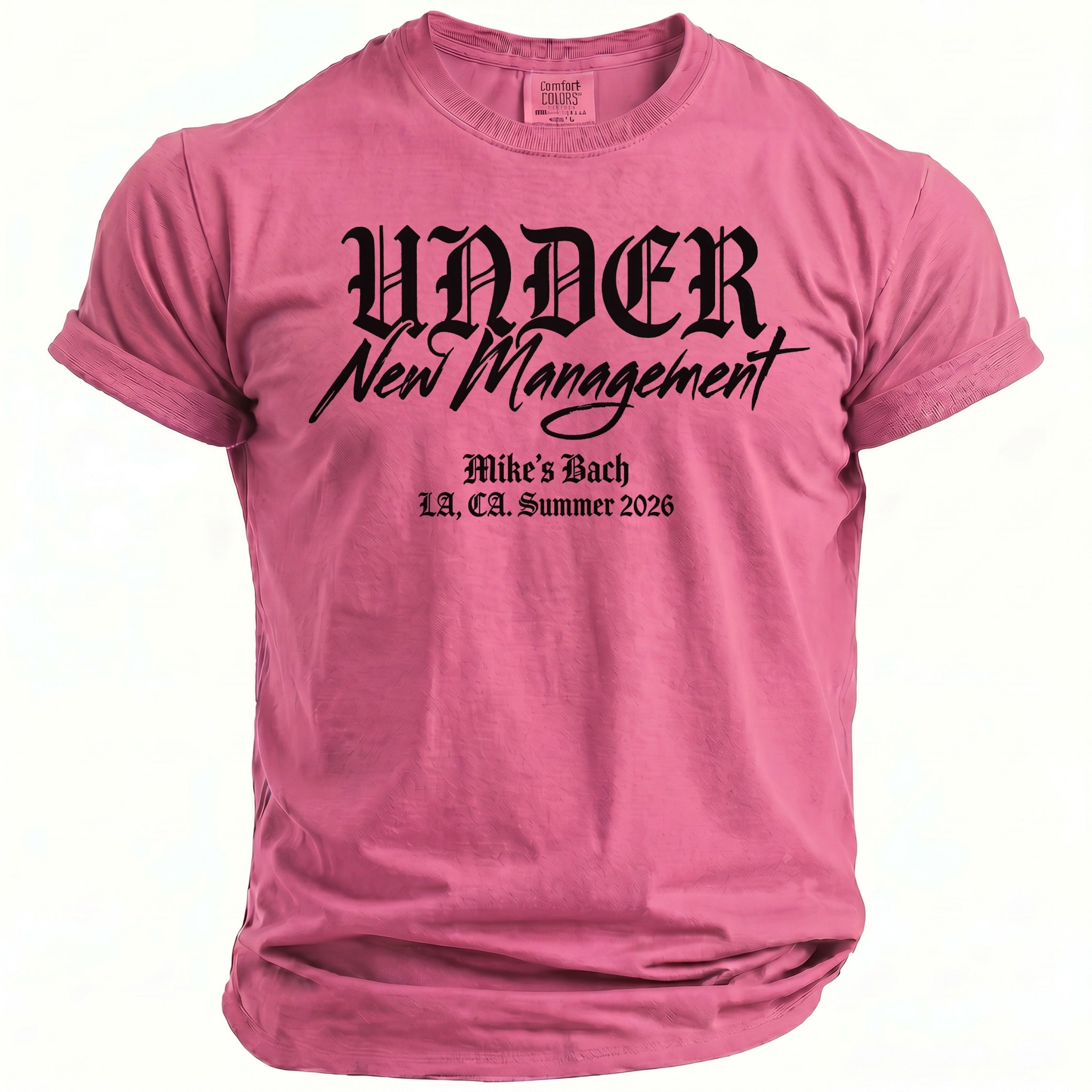 Pink t-shirt with "Under New Management", "Mike's Bach", "LA, CA. Summer 2026" text.