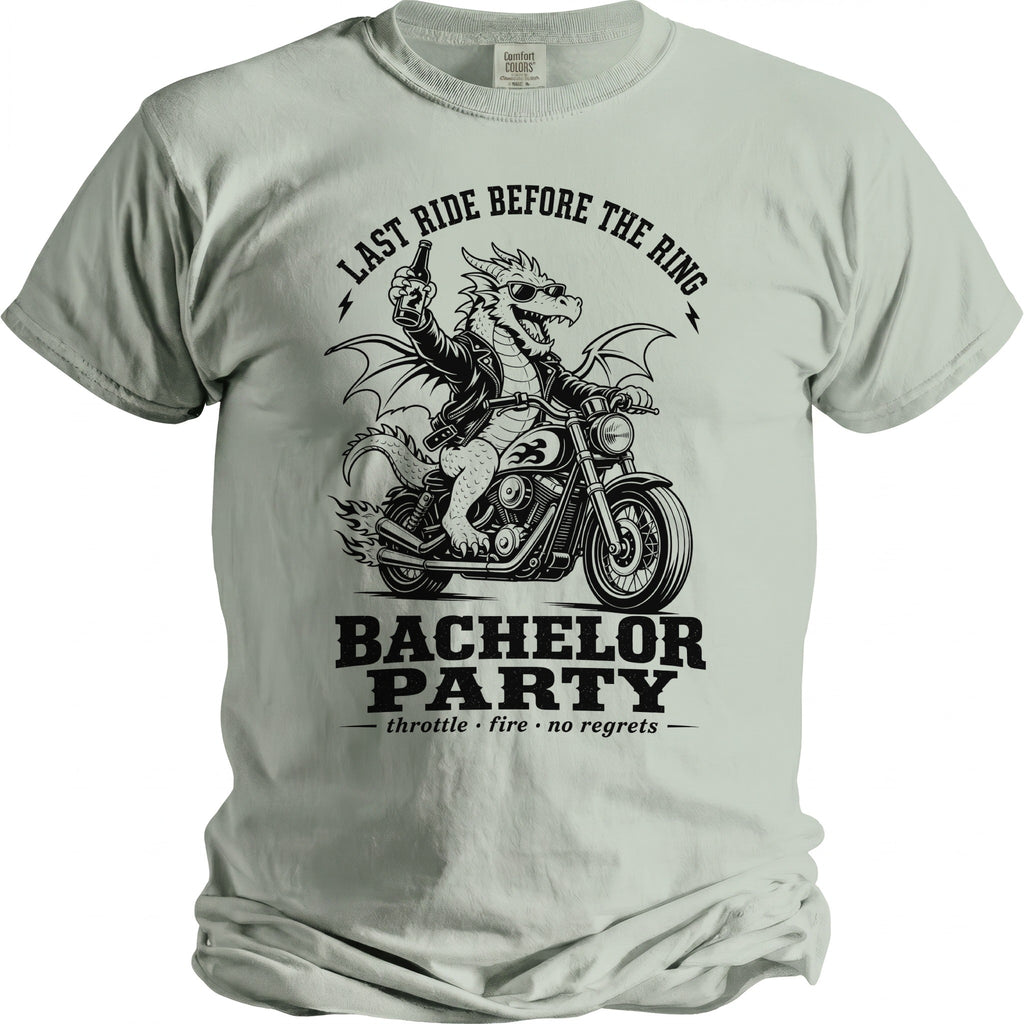 Light gray t-shirt with a dragon riding a motorcycle, saying "Last Ride Before The Ring".