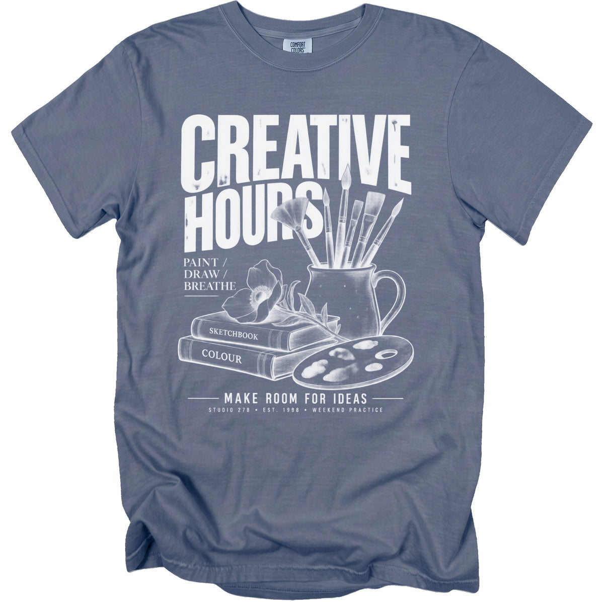 T-shirt with "CREATIVE HOURS" and art supplies graphic.
