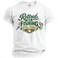 White t-shirt with green and gold text "Retired but Fishing Full Time" and fishing imagery.