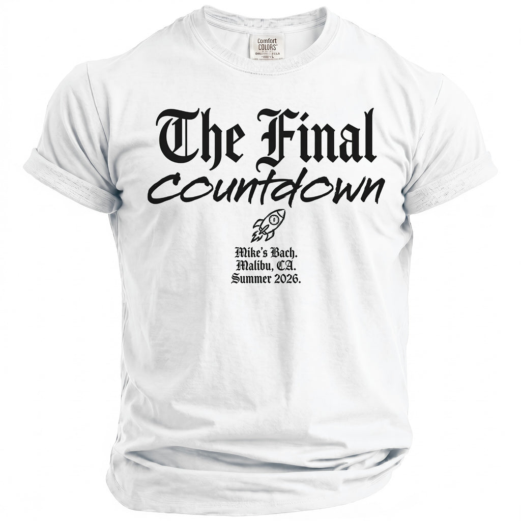 White t-shirt with black text "The Final Countdown" and rocket graphic.