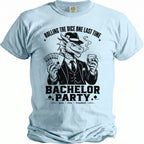 Dragon wearing a suit and hat, smoking, holding cards and a drink, with text "BACHELOR PARTY".