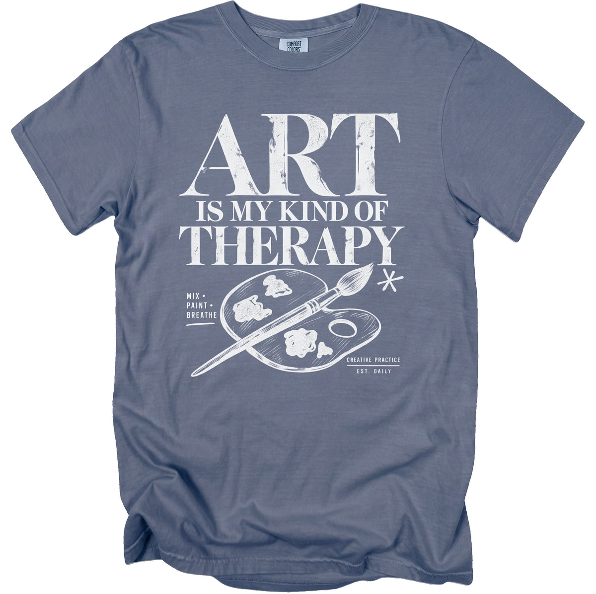 T-shirt with "ART IS MY KIND OF THERAPY" text and art supplies graphic.