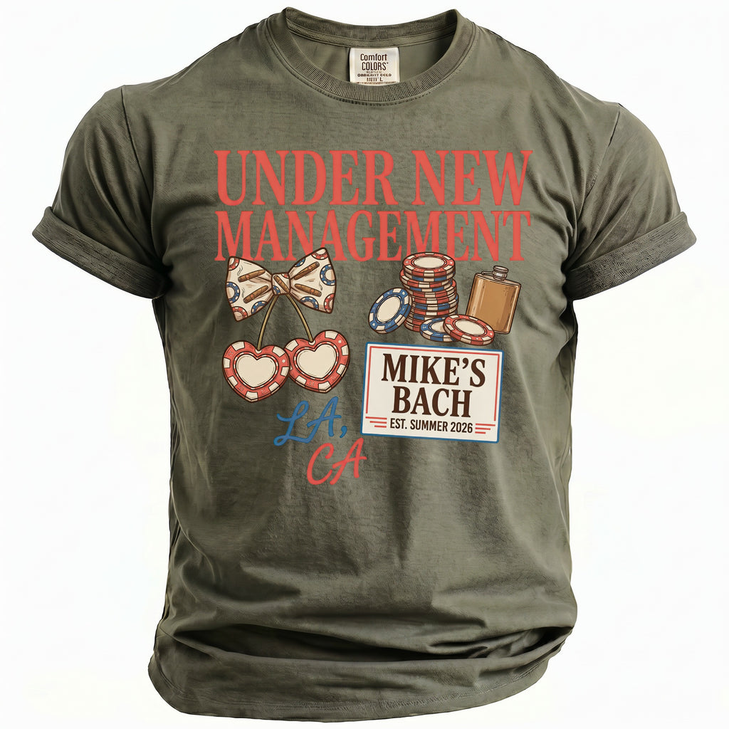 Olive t-shirt with "Under New Management" and casino-themed graphics.