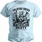 Light blue t-shirt with knight dragon holding "Groom Brew" beer, text "Fire Before Forever Bachelor Party".