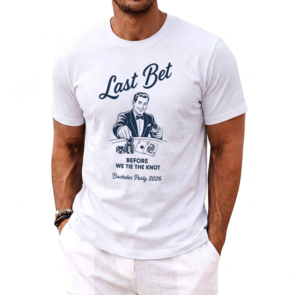 White t-shirt with "Last Bet Before We Tie The Knot Bachelor Party 2026" text.