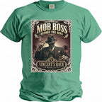 Green t-shirt featuring "Mob Boss Before the Ring" with a man holding a cigar and whiskey.