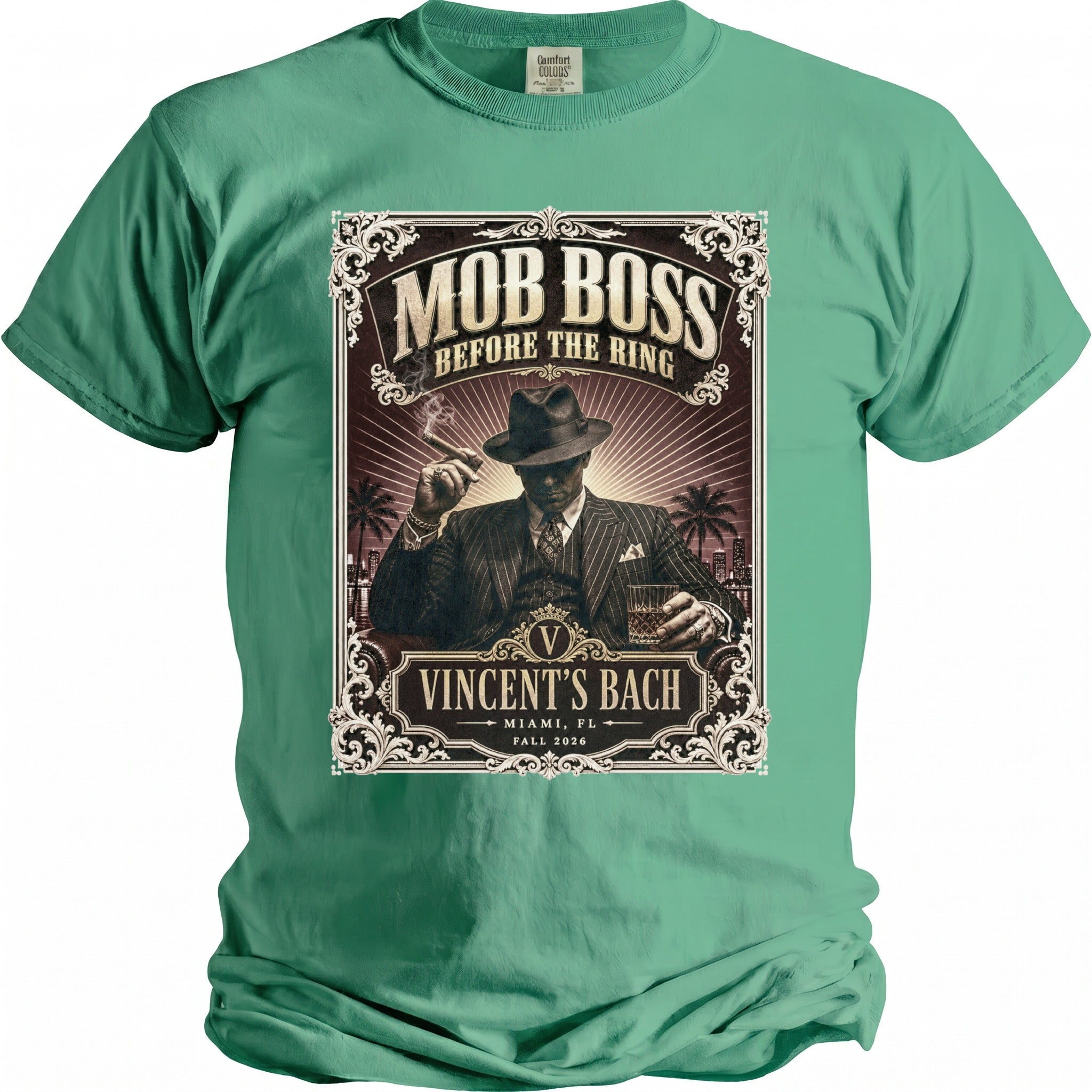 Green t-shirt featuring "Mob Boss Before the Ring" with a man holding a cigar and whiskey.