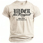 T-shirt with black text: "UNDER New Management Mike's Bach LA, CA. Summer 2026"