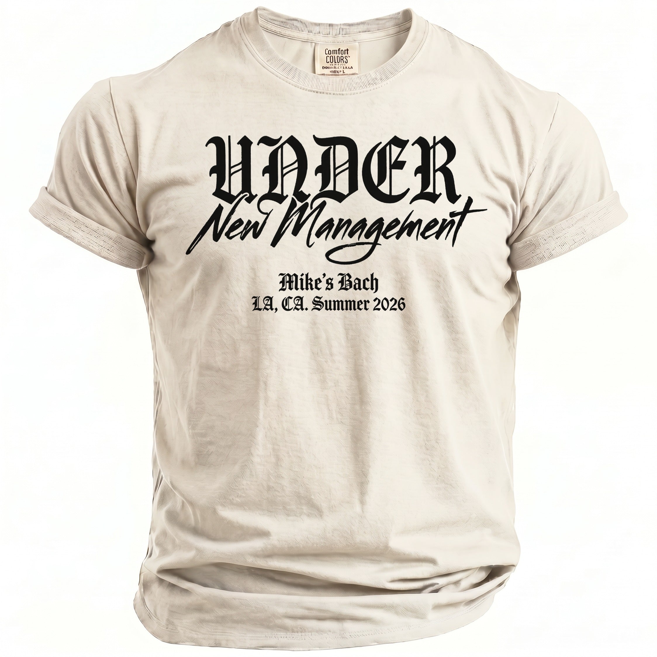 T-shirt with black text: "UNDER New Management Mike's Bach LA, CA. Summer 2026"